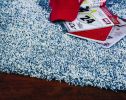 8' X 11' Indigo And Ivory Abstract Shag Hand Woven Area Rug