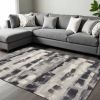 6' X 9' Gray Black And Ivory Abstract Area Rug
