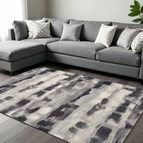 6' X 9' Gray Black And Ivory Abstract Area Rug