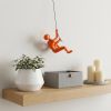 6" X 3" Orange Resin Climbing Man Hanging Dimensional Sculpture