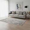 5' X 7' Beige Tan And Gold Abstract Hand Loomed Distressed Area Rug