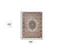 9' X 12' Blue Orange And Black Jute Medallion Hand Woven Area Rug