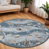 8' Beige Ivory And Brown Seashell and Coral Hand Tufted Round Rug