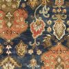 5' X 8' Navy Blue Orange And Brown Wool Medallion Hand Tufted Area Rug