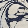 7' X 10' Blue And Ivory Abstract Area Rug