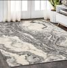 5' X 8' Gray And Ivory Abstract Area Rug