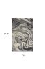 7' X 9' Ivory Black And Gray Abstract Shag Area Rug