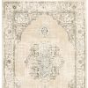 5' X 8' Beige And Ivory Center Jewel Area Rug