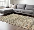 8' X 11' Ivory And Sage Abstract Area Rug