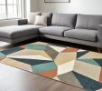 6' X 9' Blue Green And Beige Abstract Geometric Area Rug