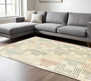 7' X 10' Ivory Blue And Red Geometric Area Rug