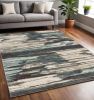 5' X 7' Ivory Blue And Gray Abstract Area Rug