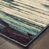 7' X 10' Ivory Blue And Gray Abstract Area Rug