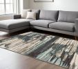 10' X 13' Ivory Blue And Gray Abstract Area Rug