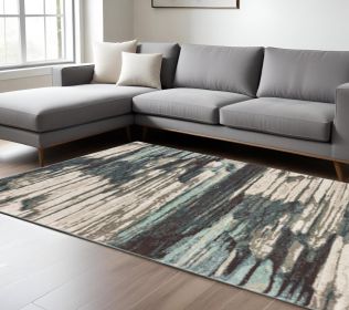 10' X 13' Ivory Blue And Gray Abstract Area Rug