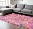 7' X 10' Fuchsia And Orange Floral Distressed Area Rug