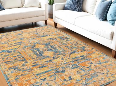 5' X 7' Teal And Gold Medallion Distressed Area Rug