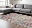 7' X 10' Ivory And Blue Abstract Area Rug
