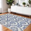 4' X 6' Ivory And Blue Damask Distressed Area Rug