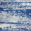 5' X 7' Ivory And Blue Ombre Distressed Area Rug