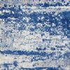 6' X 9' Ivory And Blue Ombre Distressed Area Rug