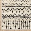 5' X 7' Ivory And Black Abstract Geometric Distressed Area Rug