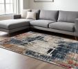 8' X 11' Blue And Ivory Abstract Area Rug