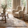 7' X 10' Beige And Ivory Abstract Area Rug