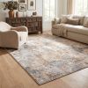 7' X 10' Beige And Ivory Abstract Area Rug