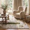 5' X 7' Green And Ivory Abstract Area Rug