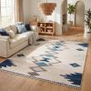 6' X 9' Blue and Ivory Southwestern Area Rug