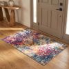 2' X 5' Blue and Ivory Abstract Area Rug