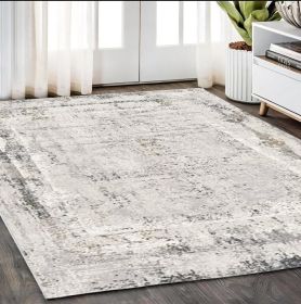 5' X 8' Gray and Ivory Abstract Power Loom Area Rug