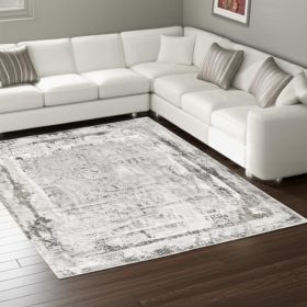 7' X 10' Gray and Ivory Abstract Power Loom Area Rug